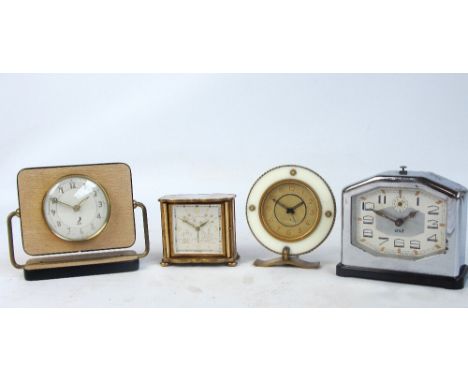 A collection of French JAZ mantel and alarm clocks, comprising a circular example, one on a Hessian pattern background on swi