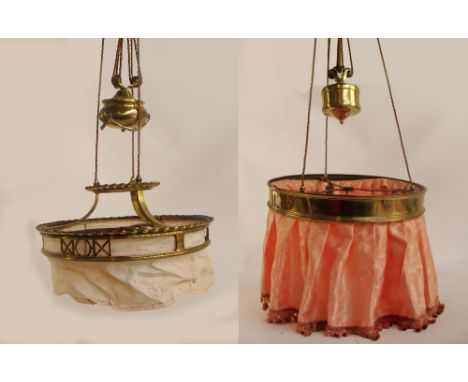 A late 19th century circular brass rise and fall ceiling light, and a further similar example (2).