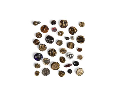 [§] LUCIE RIE D.B.E. (BRITISH, 1902-1995) FOR BIMINI34 BUTTONS, CIRCA 1940S the majority with Bimini brass backs, pressed gla
