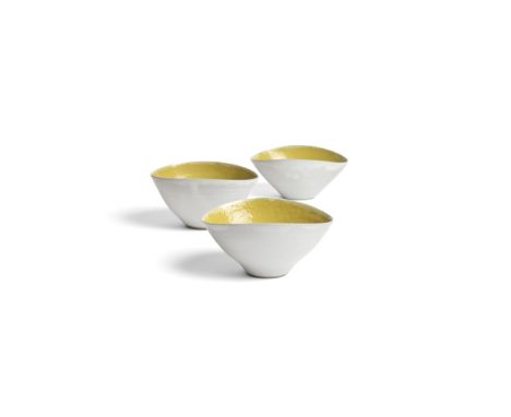 [§] LUCIE RIE D.B.E. (BRITISH, 1902-1995)SET OF THREE BOWLS each impressed artist's seal, white glaze to the exteriors and mu