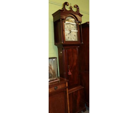 A mahogany thirty hour longcase clock, the later painted arch dial bearing an inscription Sagar, Skipton