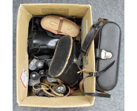 A collection of assorted cased binoculars, camera and a Cine camera 