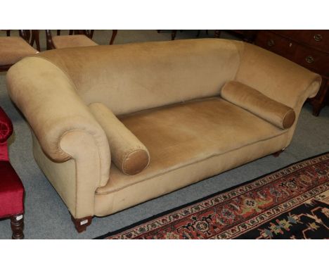 An Edwardian Chesterfield sofa with two small bolsters 