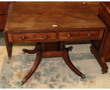 A George III crossbanded mahogany sofa table 