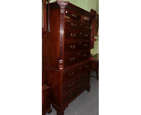 A George III mahogany chest on chest, late 18th century, the dentil cornice above two short and four long graduated drawers a