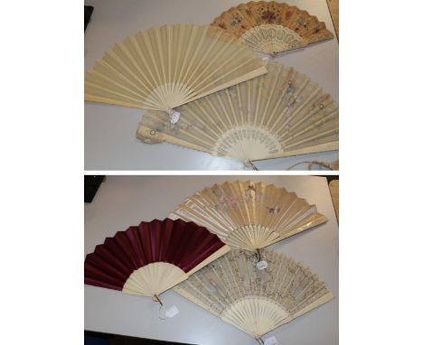 A late 19th century early 20th century bone fan, the monture carved, pierced and clouté, the vibrant double fabric leaf unusu