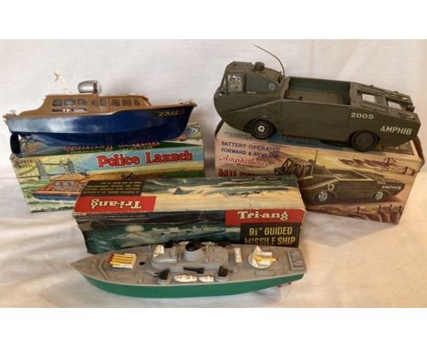 Marx: A boxed Marx Toys, Amphibious Military Vehicle and Police Launch, both battery operated and boxed, along with Triang cl