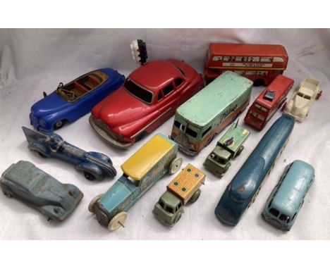 Tinplate: A collection of assorted vintage tinplate vehicles to include Wells Brimtoy Bus and trucks, Marx convertible, Golde