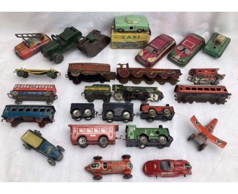 Tinplate: A collection of assorted vintage tinplate vehicles to include: Codeg clockwork car with box, Kay Railway engine and