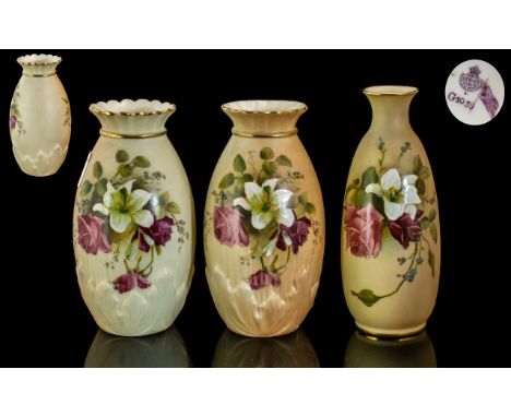 Three Worcester Blush Ivory Vases, a pair of moulded vases model G1039, and another 2491.  All painted with floral decoration