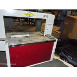 Dynaric Inc. Carton Strapping Machine