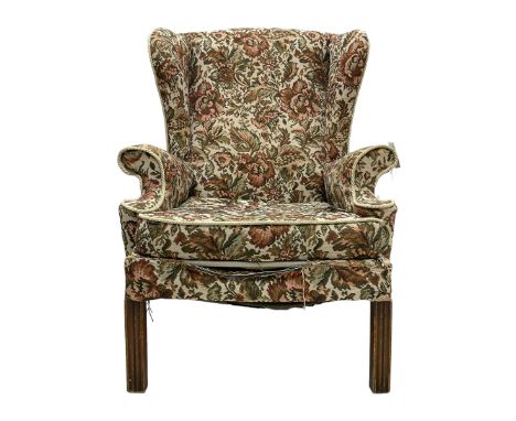 Parker Knoll - mid-20th century wingback armchair, upholstered in tapestry style floral fabric, raised on square moulded supp