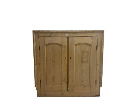 George III pine wall cupboard doors for architectural niche or cupboard, arched panelled doors, in moulded frameDimensions: H
