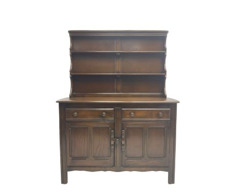Ercol - dark elm dresser, raised two-tier plate rack above two drawers and two panelled cupboardsDimensions: Height:&nbsp;161
