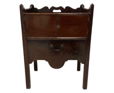 George III mahogany tray top night-cabinet commode, the three quarter gallery with pierced handle back, the rectangular slidi