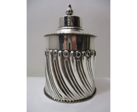 A Victorian silver tea caddy by William Comyns, London 1895 of cylindrical form with reeded, fluted and ring ornament, 5" h, 