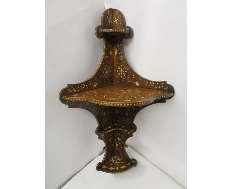 A late 19th century Anglo Indian bone inlaid hardwood, four tier hanging corner shelf, with scrolled, floral decoration, 29 1