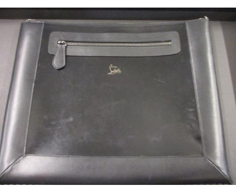A Christian Louboutin leather folio bag with stud detail to the sides and a red interior 