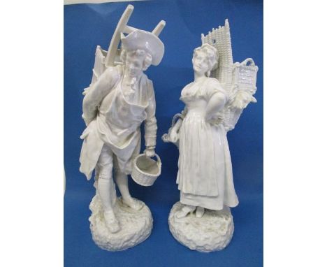 A pair of late 19th century white glazed porcelain figures, each of a man and woman carrying a grape hod, stamped London blan