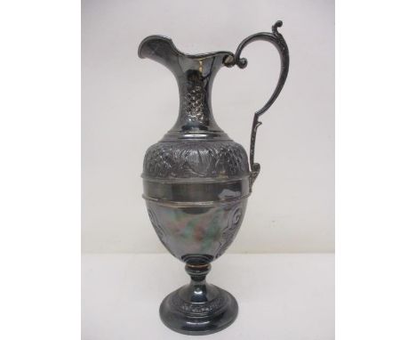 A silver wine ewer by Mappin &amp; Webb, London 1979 of ovoid form on a pedestal foot, decorated with fruiting veins, 11 3/4"