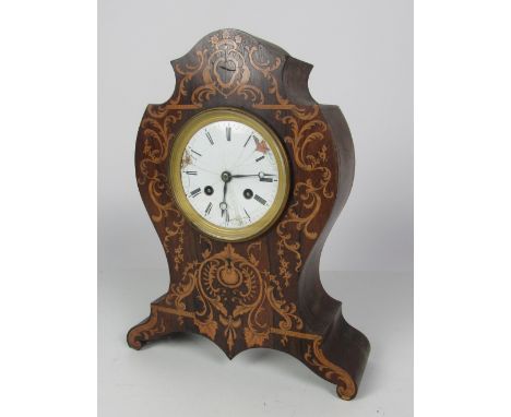 An unusual shaped 19th Century French inlaid rosewood Mantle Clock, with circular enamel dial, works stamped Henri Mark, Pari