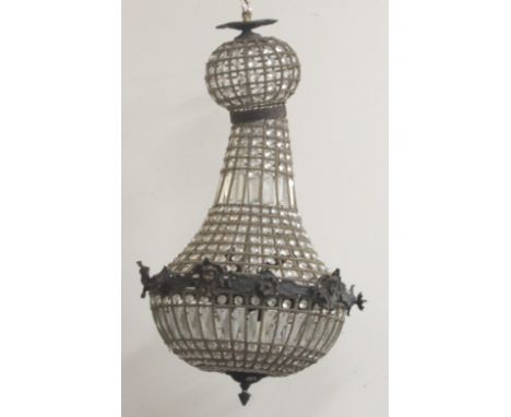 An unusual Chandelier, with cutglass drops and lustres, the rim decorated with masks etc., 82cms (32") high. (1)