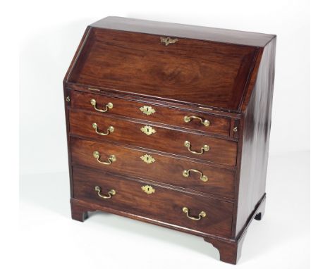 A good quality George III period plain mahogany Bureau, of attractive proportions, the slope front opening to reveal a fitted
