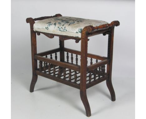 An unusual Edwardian walnut telescopic Piano Stool, with upholstered seat possibly Schoolbred. (1)