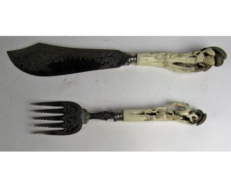 A cased set of silver plated bright cut Fish Servers, each with carved bone / horn handle decorated in the Japanese taste wit