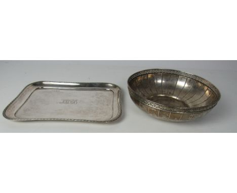 A small shaped rectangular silver Tray, Birmingham 1907, approx. 16 ozs; and an unusual circular Sterling silver Bowl with de