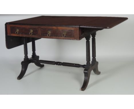 A very good quality George III period mahogany Sofa Table, the rectangular top with crossbanded edge, over two frieze drawers