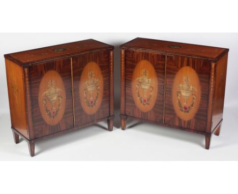 A pair of attractive George III style painted Commodes, the inverted tops with central painted musical garlands, flowers and 