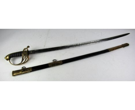 A good early 19th Century Officers Sword, with finely engraved sabre blade, stamped Canber & Brown, London & Dublin, the bras