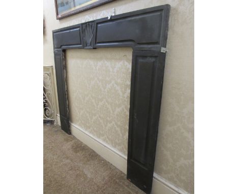 A Queen Anne / George I black slate marble Chimney Piece, with shell decorated centre panel decorated uprights, approx. 122cm