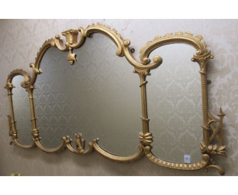 A Chinese Chippendale style three compartment giltwood Overmantel, with C scroll designs, animals, fruit etc., approx. 165cms