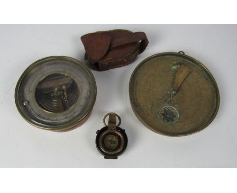 A 19th Century circular brass Holosteric Barometer / Fahrenheit's Thermometer; a rare circular Oriental Sundial Compass, prof