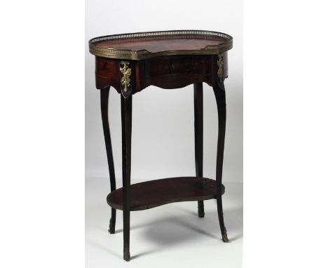 A small kidney shaped Side Table, the pierced brass gallery over a kingwood segmented top, and frieze drawer, on cabriole typ