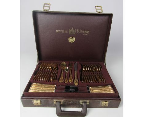 A cased set of Bestecke (S.B.S.) 24 carat Hartvergoldet Solingen Cutlery, for a 12 setting, including knives, forks, spoons, 