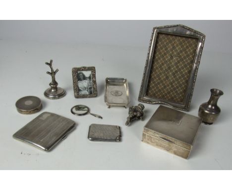 A silver Vesta Case, Cigarette Case, Cigarette Box, Ring Holder, Powder Box, two small silver Frames, a small rectangular sil