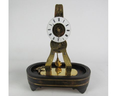 A good quality small late 19th Century French Skeleton Clock, by Pierret & Co. Paris, the white enamel dial with Roman numera