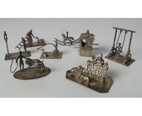 Miniature Silver Toys: A collection of eight silver miniature groups, figures etc., including Birmingham silver "Sedan Chair"
