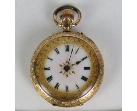 An attractive small Edwardian 14ct gold Ladies keyless Watch, the engraved body enclosing a gilt decorated enamel dial, the b