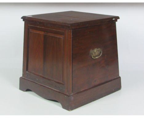 An Edwardian walnut Commode of tapering square shape, fitted with porcelain bucket. (1)