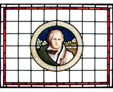 An attractive rectangular stained glass Panel, in oak frame, with claret red border, green ground centre with a circular deta