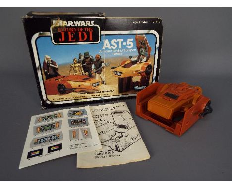 Star Wars, Kenner - A vintage boxed Kenner Star Wars ROTJ 'AST-5 Armored Sentinel Transport Vehicle'. The vehicle appears to 