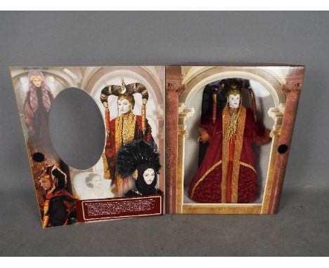 Star Wars, Hasbro - A boxed 1999 Star Wars Portrait Edition 12" figure 'Queen Amidala in Red Senate Gown'. The finely crafted