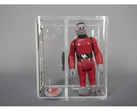 Star Wars - A loose vintage and graded Star Wars 'A New Hope' 3 3/4 action figure 'Snaggletooth' . The figure is UK Graded at
