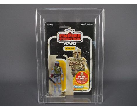 Star Wars, Kenner - A vintage 1979 Kenner Star Wars TESB 'Boba Fett' 3 3/4" carded action figure. The figure is open and with