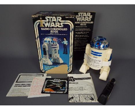 Star Wars - Kenner - A boxed 1978 Radio Controlled 8" R2-D2 with light and sound. # 38430. The model appears in Excellent con