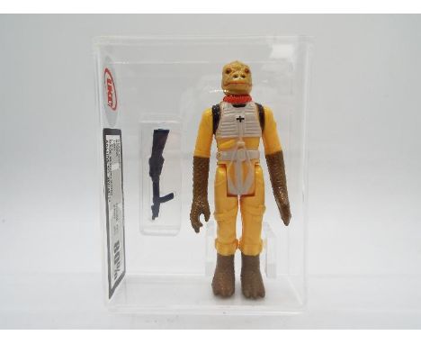 Star Wars - A loose vintage and graded Star Wars TESB 3 3/4 action figure 'Bossk'. The figure is UK Graded at 80% overall, wi